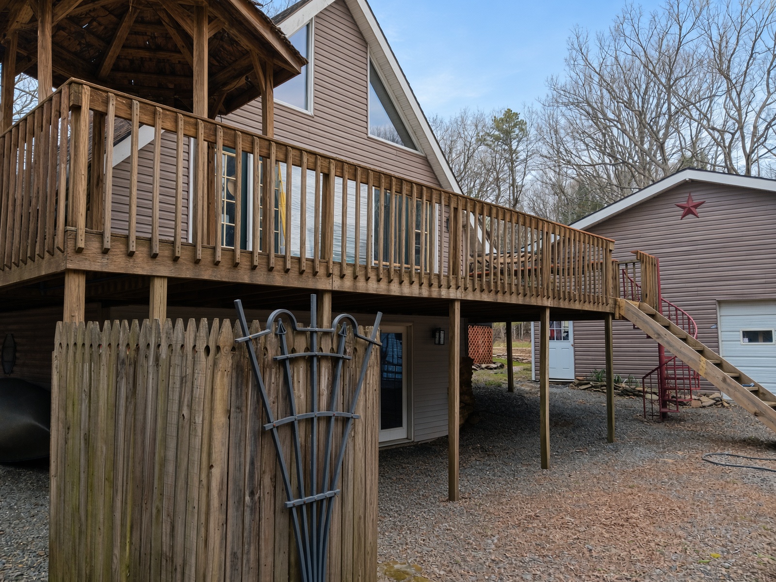 Elevated wooden deck with full railing system