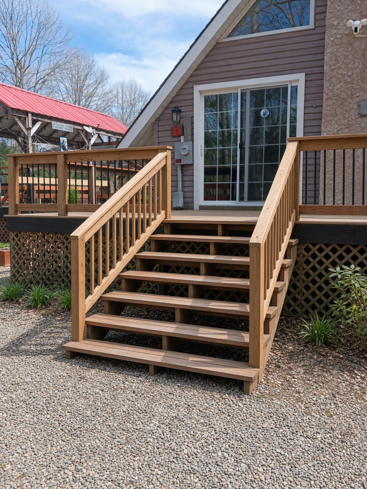 Wooden deck stairs with railings